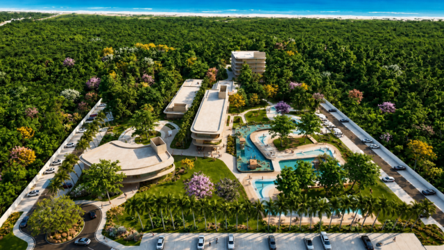Vista aérea do projeto do Senses Park & Resort, com edifícios, piscinas e áreas verdes cercadas por vegetação, com o mar ao fundo.